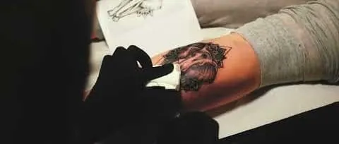 A frame from “Tattoo studio launch film”, 2 of 3.